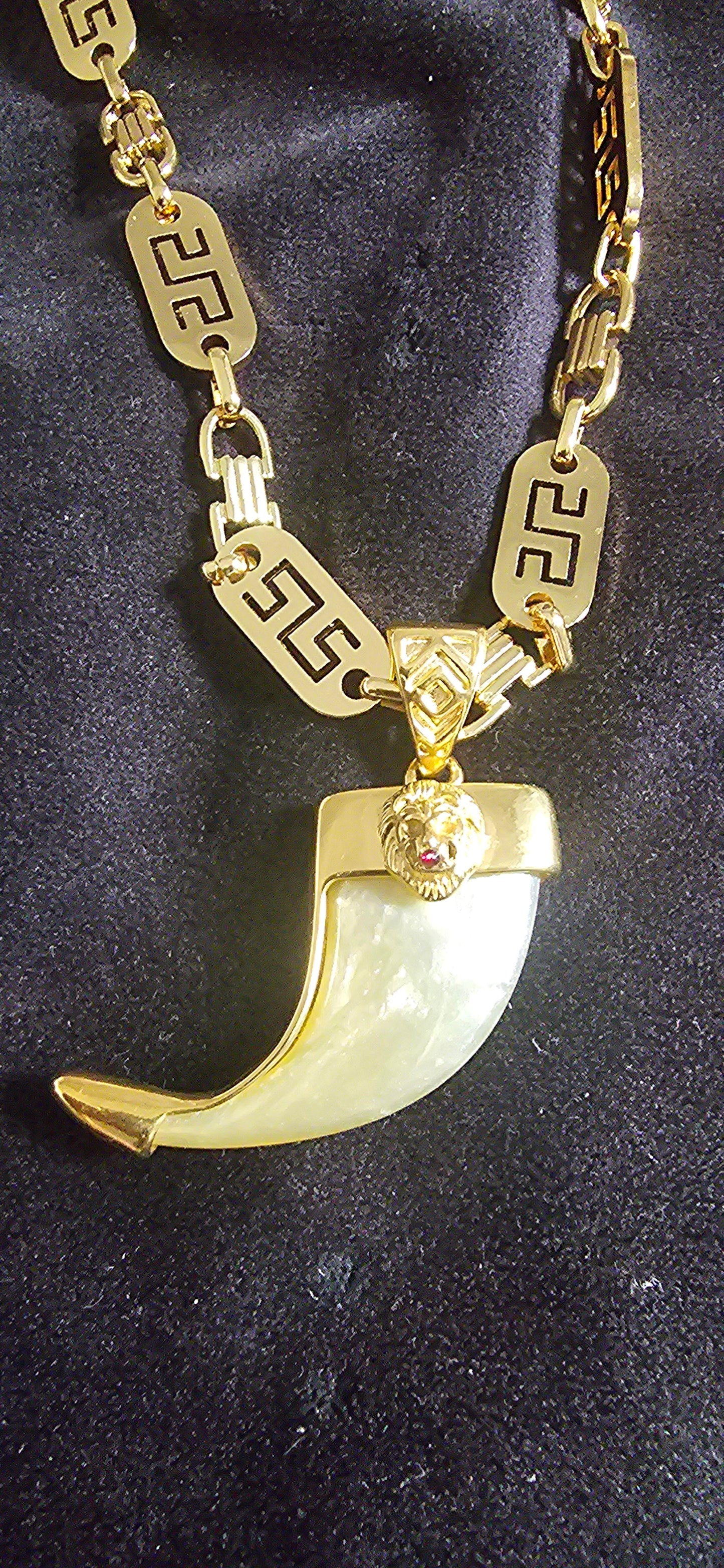 ensemble collier et pendentif griffe de lion